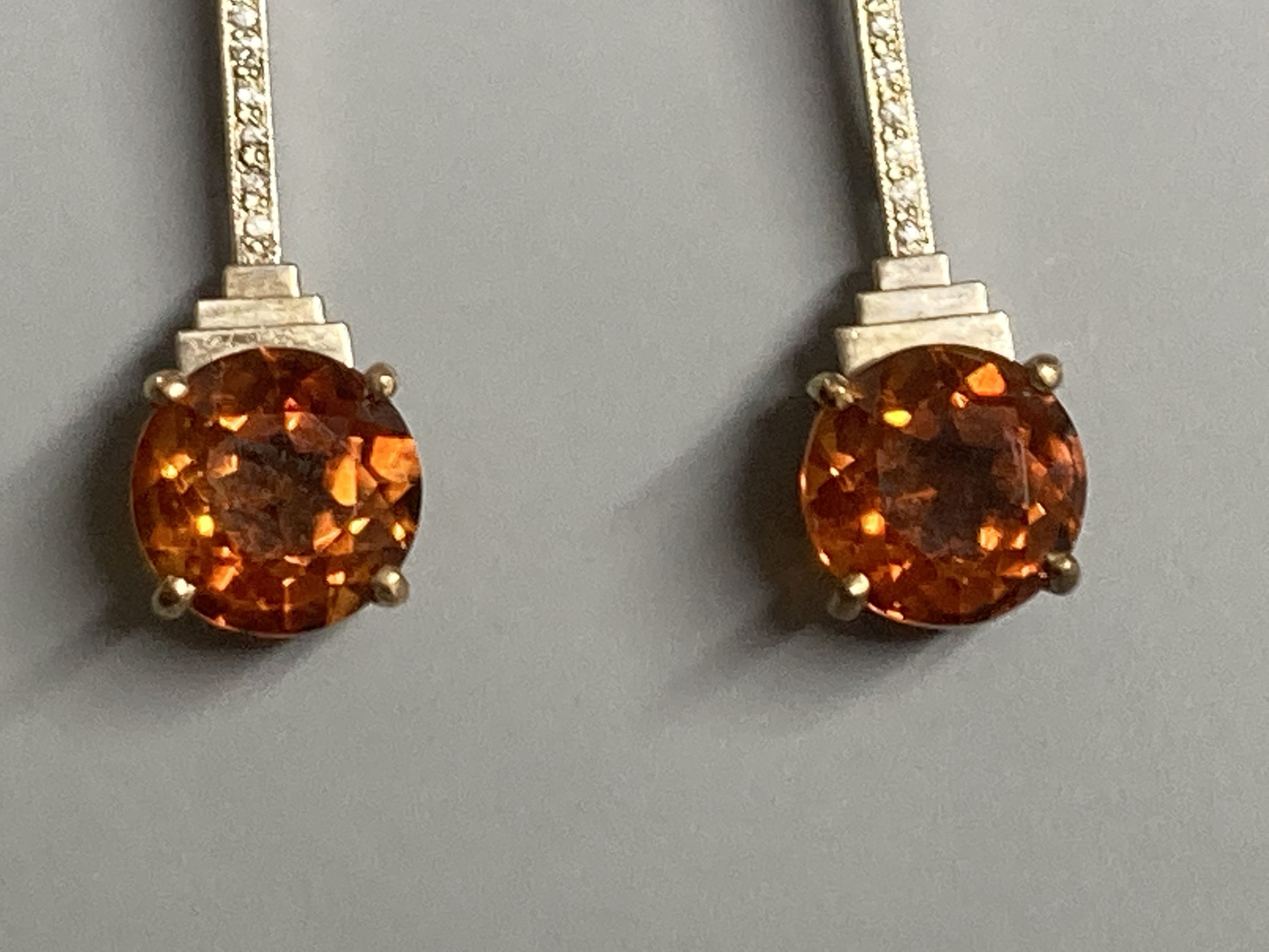 A pair of Art Deco style yellow and white metal, citrine and diamond chip set drop earrings, (no butterflies), 32mm, gross weight 3.8 grams.